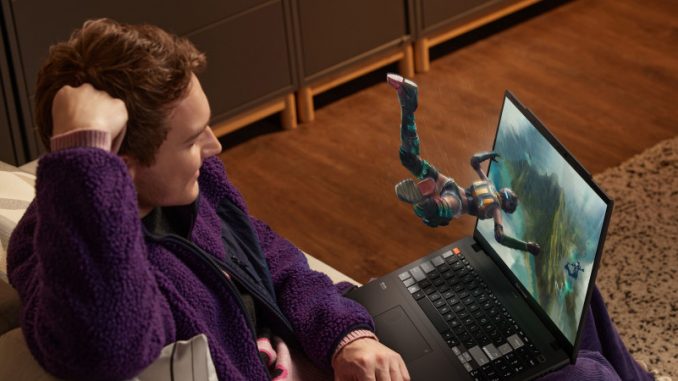 spatial-vision-technologie-vision-en-3d-pc-asus Un jeune homme en train de visionner des jeux en 3D sur le Vivobook Pro 16 3D OLED doté de la technologie Spatial Vision.