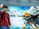 Un développeur gaming en train de prendre un selfie devant l’affiche du dernier épisode en lice du jeu vidéo Zelda.