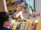 En Chine, les jeunes échappent à la réalité avec des jeux de grattage  