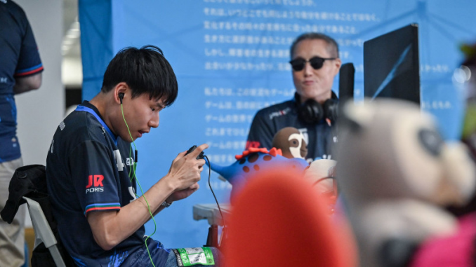 joueur-esports-aveugle-chatgpt-outils-ia-assistance Le joueur d’eSports aveugle en plein tournoi de Para eSports.