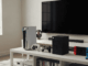 PlayStation, Xbox et Nintendo alignées sur un meuble TV